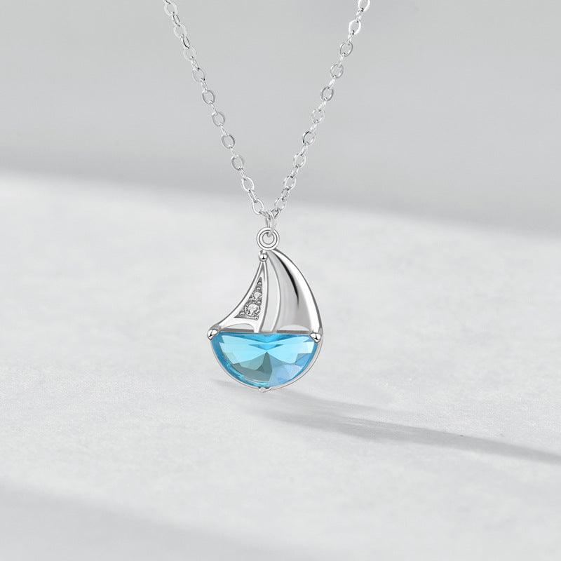 Nautical-Inspired 925 Sterling Silver Sailboat Necklace with Sparkling Blue CZ - Perfect jewelry for Casual or Dressy Occasions!